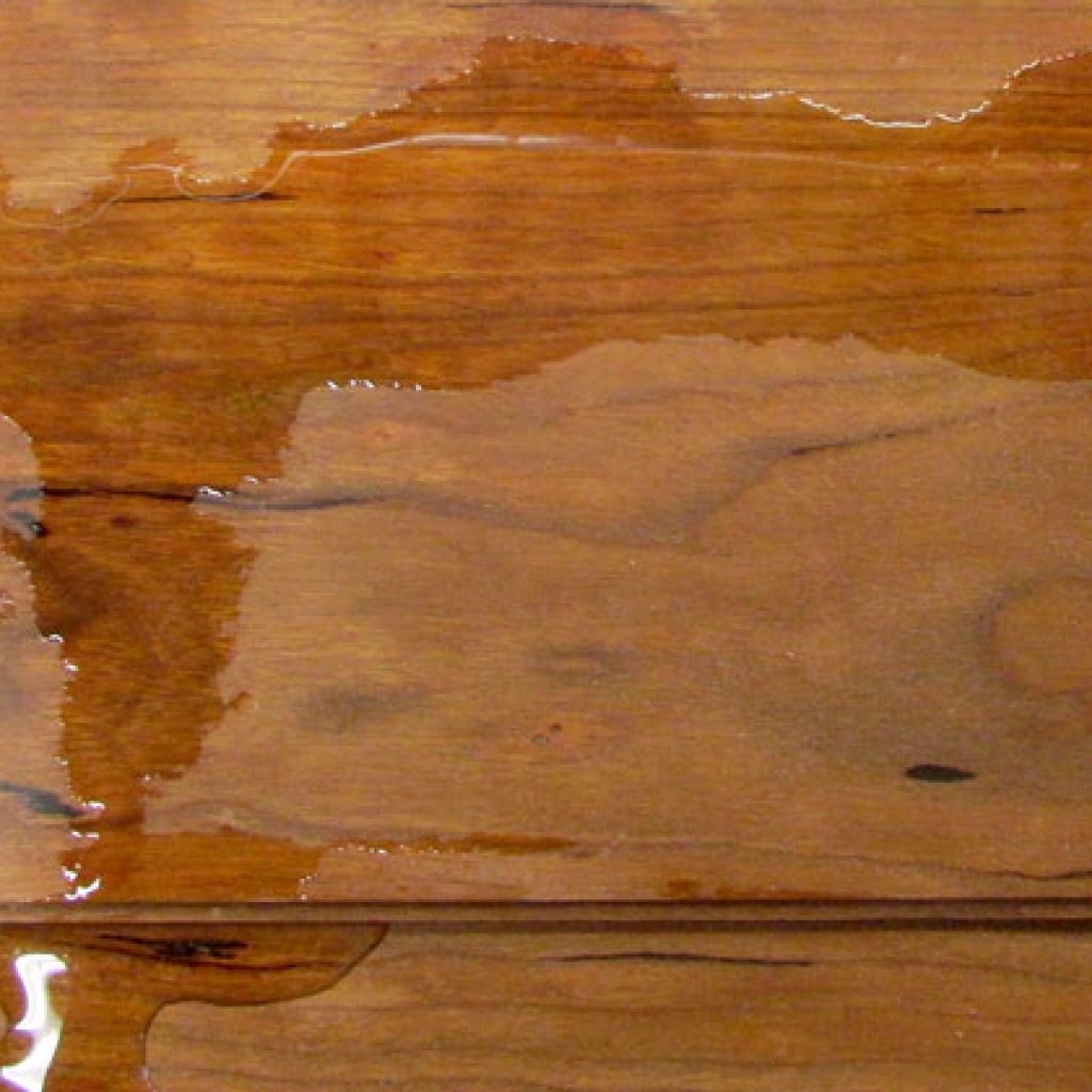 This is an image of a watermark on a custom piece of furniture.