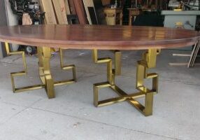 oval walnut table with brass base 2